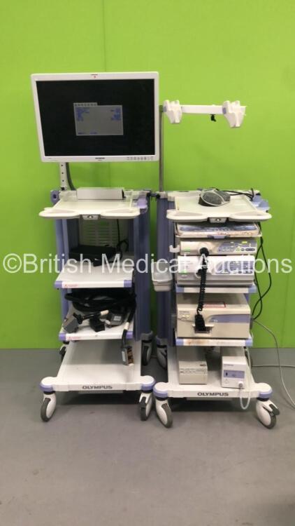 2 x Olympus Stack Trolley with Olympus OEV261H Monitor, Olympus ECS260 Connector Cable, Olympus MAJ-1154 Pigtail Connector, Olympus Evis Lucera CV-260SL Digital Processor, Olympus Evis Lucera CLV-260SL Light Source, Olympus EndoEcho EU-M200 Endoscopic Ul