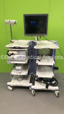 2 x Olympus Stack Trolleys with Olympus OEV191H Monitor, Olympus ECS-260 Connector Cable, Olympus MAJ-1154 Pigtail Connector, Olympus Evis Lucera CV-260SL Digital Processor, Olympus Evis Lucera CLV-260SL Light Source and Olympus UCR Co2 Insufflator (Power