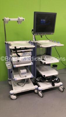 2 x Olympus Stack Trolleys with Olympus OEV191H Monitor, Olympus ECS-260 Connector Cable, Olympus MAJ-1154 Pigtail Connector, Olympus Evis Lucera CV-260SL Digital Processor, Olympus Evis Lucera CLV-260SL Light Source and Olympus UCR Co2 Insufflator (Power - 10