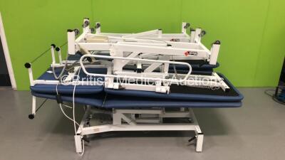 4 x Medi-Plinth Electric Patient Examination Couches with 2 x Controllers (2 x Power Up - 1 x Missing Electric RAM)