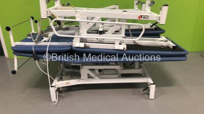 4 x Medi-Plinth Electric Patient Examination Couches with 2 x Controllers (2 x Power Up - 1 x Missing Electric RAM) - 2