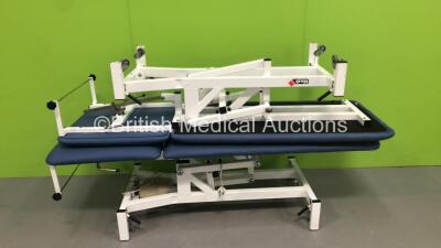 4 x Medi-Plinth Electric Patient Examination Couches with 2 x Controllers (2 x Power Up - 1 x Missing Electric RAM) - 3