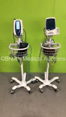 1 x Welch Allyn SPOT Vital Signs LXi Monitor on Stand with SPO2 and Finger Sensor and BP Hose (Not Power Tested Due to No Power Supply) and 1 x Welch Allyn SPOT Vital Signs Monitor on Stand with BP Hose and Cuff (Powers Up)