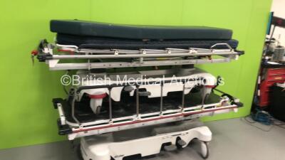 2 x Stryker 1037 Trauma Stretchers with Mattresses (Hydraulics Tested Working), 1 x Hoskins Hydraulic Patient Trolley with Mattresses (Hydraulics Tested Working) and 1 x Huntleigh Nesbit Evans Hydraulic Patient Trolley (Hydraulic Tested Working) - 4