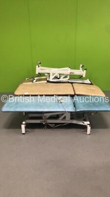 1 x Akron Hydraulic Patient Examination Couch (Hydraulics Tested Working), 1 x Medi-Plinth Electric Patient Examination Couch with Controller, 1 x Akron Hydraulic 3 Way Patient Examination Couch (Hydraulics Not Working) and 1 x Medi-Plinth Hydraulic Pati