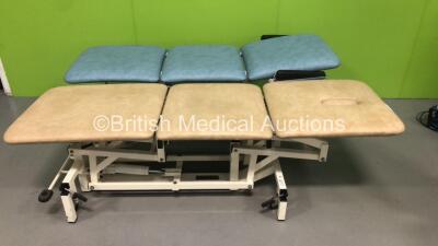 1 x Akron 3 Way Hydraulic Patient Couch (Hydraulics Tested Working) and 1 x Medi-Plinth Electric Patient Couch with Controller (Powers Up) *S/N 503131 / 503134*