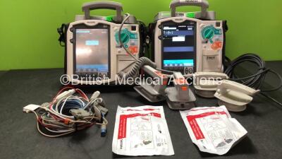 2 x Philips MRx Defibrillators Including Pacer, ECG, SpO2, NIBP and Printer Options with 2 x Philips M3539A Batteries, 2 x M3538A Batteries, 2 x Hard Paddles, 2 x Adult Electrodes *Exp 09/2022, 11/2022* 2 x 3 Lead ECG Leads and 2 x SpO2 Finger Sensors (Bo