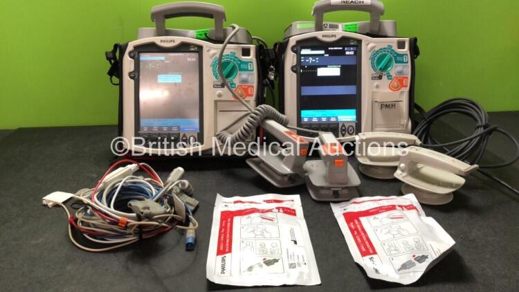 2 x Philips MRx Defibrillators Including Pacer, ECG, SpO2, NIBP and Printer Options with 2 x Philips M3539A Batteries, 2 x M3538A Batteries, 2 x Hard Paddles, 2 x Adult Electrodes *Exp 09/2022, 11/2022* 2 x 3 Lead ECG Leads and 2 x SpO2 Finger Sensors (Bo