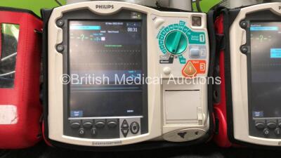 2 x Philips MRx Defibrillators Including Pacer, ECG, SpO2, NIBP and Printer Options with 1 x 3 Lead ECG Lead, 1 x SpO2 Finger Sensor, 1 x NIBP Hose, 1 x BP Cuff, 2 x Philips M3539A Batteries, 2 x M3538A Batteries, 2 x Hard Paddles, 2 x Printer Paper Reels - 2