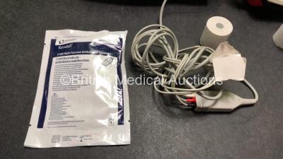 2 x Philips MRx Defibrillators Including Pacer, ECG, SpO2, NIBP and Printer Options with 2 x 3 Lead ECG Leads, 2 x Laerdal CPR Meters, 2 x Electrode Pads, 1 x Hard Paddle Mounting Bracket, 2 x Philips M3539A Batteries, 2 x M3538A Batteries and 4 x Covidie - 8