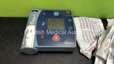 Mixed Lot Including 1 x Laerdal Heartstart FR2 Defibrillator (No Power when Tested with Stock Battery-Battery Not Included) 1 x Welch Allyn Ref 901050 Ambulatory Blood Pressure Monitor (No Power) 1 x Living Science Digital Blood Pressure Monitor (Powers U - 2