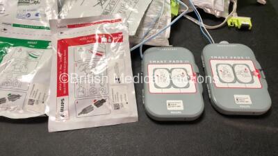 Mixed Lot Including 1 x Laerdal Heartstart FR2 Defibrillator (No Power when Tested with Stock Battery-Battery Not Included) 1 x Welch Allyn Ref 901050 Ambulatory Blood Pressure Monitor (No Power) 1 x Living Science Digital Blood Pressure Monitor (Powers U - 4