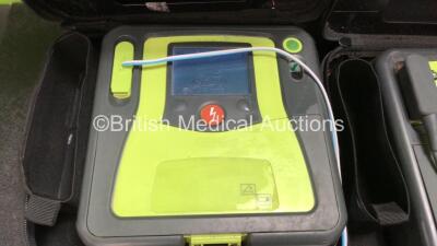 3 x Zoll AED Pro Defibrillators with 1 x Electrodes, 2 x 3 Lead ECG Lead and 3 x Batteries in Carry Case (All Power Up 2 with Damaged Screens-See Photos ) - 2