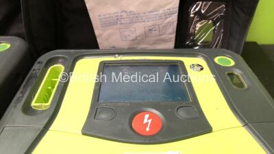 4 x Zoll AED Pro Defibrillators with 1 x Electrodes, 1 x 3 Lead ECG Lead and 4 x Batteries in Carry Case (All Power Up 2 with Damaged Screens-See Photos ) - 3