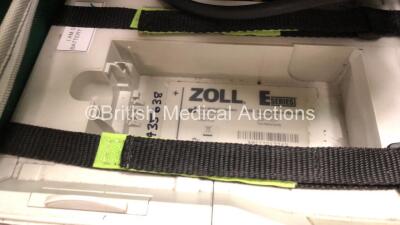 Job Lot Including 1 x Zoll E Series Defibrillator with 1 x SpO2 Leads, 1 x SpO2 Finger Sensor, 1 x ECG Leads, 1 x NIBP Lead, 1 x BP Cuff, 1 x Zoll Lo Flo Module and 1 x Battery (Powers Up) 1 x Zoll Sure Power Battery Charger with 4 x Batteries (Powers Up) - 5