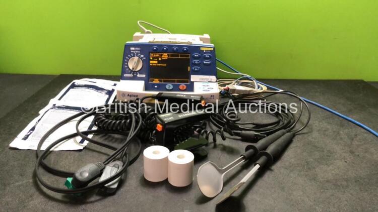 Philips Heartstart XL Smart Biphasic Defibrillator Including Pacer, ECG and Printer Options with 1 x M1742A Internal Hard Paddle, 1 x 3 Lead ECG Lead, 1 x SpO2 Lead, 1 x Battery, 1 x M4746A External Hard Paddles, 1 x Paddle Lead and 3 x Electrodes (Powers