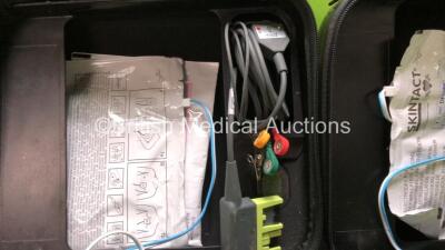 2 x Zoll AED Pro Defibrillators with 2 x 3 Lead ECG Leads and 2 x Electrodes in Carry Cases (Both Power Up) - 4