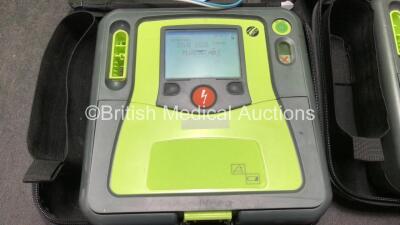 2 x Zoll AED Pro Defibrillators with 2 x Electrodes in Carry Cases (Both Power Up) - 2