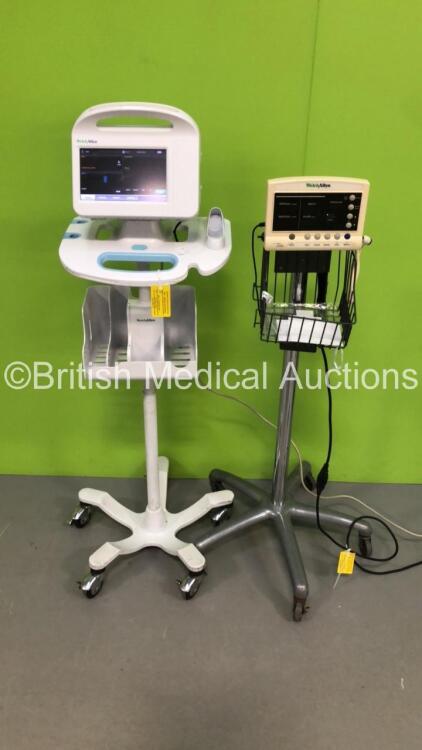 1 x Welch Allyn 6000 Series Vital Signs Monitor on Stand and 1 x Welch Allyn 52000 Series Patient Monitor on Stand (Both Power Up)