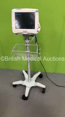 Philips IntelliVue MP50 Neonatal Patient Monitor Ref 862116 on Stand with Philips M3001A Module with Press, Temp, NBP, SPO2 and ECG/Resp Options (Powers Up - Damage to Screen Surround - Release Clip for Module Broken - See Pictures)