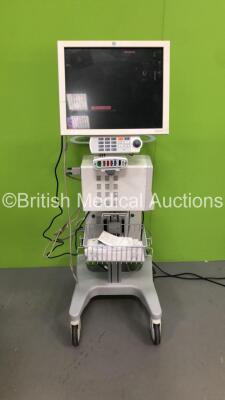 GE CDA19T Patient Monitor on Stand with GE TRAM-RAC 4A Module Rack with Capnostat Mainstream CO2 Module, GE Solar 8000i Dual Video Control Unit and GE Patient Data Module Ref 2016793-003 with NIBP, Temp/CO, P1/3, P2/4, SPO2 and ECG Options (Powers Up)