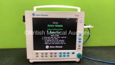 Datex Ohmeda S/5 Compact Anesthesia Monitor with 1 x Datex Ohmeda M-CAiOV Gas Module with Spirometry Options and D-fend Water Trap, 1 x Datex Ohmeda M-NESTPR Module Including ECG, SpO2, P1, P2, NIBP, T1 and T2 Options (Powers Up with Damaged Side Catch-Se