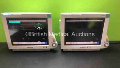 2 x Philips IntelliVue MP70 Neonatal Monitors (Both Power Up) with 2 x Philips M3001A Modules Including NBP, SpO2, ECG and Resp Options *Mfd 2010 - Refurbished 2012* **DE907W4160 - DE632H3943 - DE843AO454 - DE843AO456* (RI)