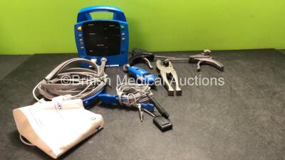 Mixed Lot Including 1 x Dinamap Procare 300 Patient Monitor with 1 x SpO2 Finger Sensor and 1 x NIBP Hose with BP Cuff, 1 x GE TAT 5000S-TTL Temporal Artery Thermometer and 3 x DePuy Surgical Instruments *SN 2019194-001, A151602*