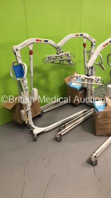 3 x Liko UNO 102 Electric Patient Hoists with Controllers and 3 x Boxes of Patient Slings (3 x No Power-Suspected Flat Batteries) - 3