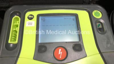 2 x Zoll AED Pro Defibrillators with 2 x ECG Leads, 2 x Batteries, 2 x Stat-Padz Electrodes *Both Expiry*, 1 x CPR Stat-Padz Electrode *Expiry 05/2022* and 1 x Skintact Electrode *Expiry 06/2023* in Carry Cases (Both Power Up with 1 x Damaged Screen) - 2