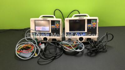 2 x Medtronic Physio-Control Lifepak 20 Defibrillator / Monitors with ECG and Printer Options, 2 x 4 Lead ECG Leads and 2 x Paddle Leads (Both Power Up with Missing Doors and Damaged Casing)