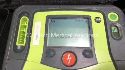 2 x Zoll AED Pro Defibrillators with 2 x Batteries (1 x Good Battery and 1 x Flat Battery) , 3 x Skintact Electrodes *All Expire 10/2023* 1 x Stat-Padz Electrode *Expiry*, in Carry Cases (Both Power Up, 1 with Damaged Screen and Slight Damage to Casing, 2 - 2