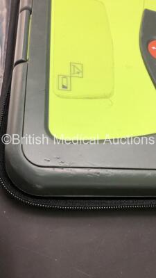 2 x Zoll AED Pro Defibrillators with 2 x Batteries (1 x Good Battery and 1 x Flat Battery) , 3 x Skintact Electrodes *All Expire 10/2023* 1 x Stat-Padz Electrode *Expiry*, in Carry Cases (Both Power Up, 1 with Damaged Screen and Slight Damage to Casing, 2 - 4