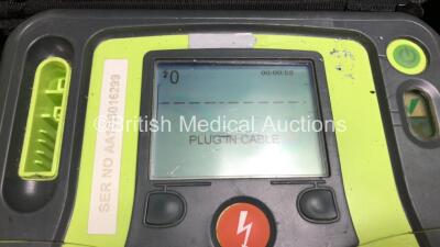 2 x Zoll AED Pro Defibrillators with 2 x Batteries (2 x Low Battery) , 3 x Skintact Electrode *1 x Expires 04/2022 and 2 x Expiry* and 1 x Stat-Padz *Expiry*, in Carry Cases (Both Power Up with Slight Damage to Screens, 2 Batteries Included, 2 x Low Batte - 2