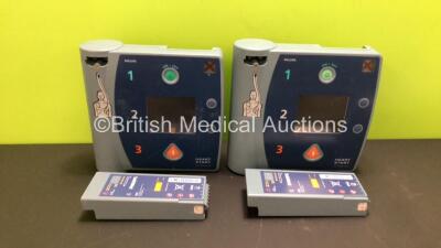 2 x Philips Heartstart FR2+ Defibrillators with 2 x Batteries Install By - 10/2023 and 2/2022 (Both Power Up in French Display, 2 Low Batteries Included)