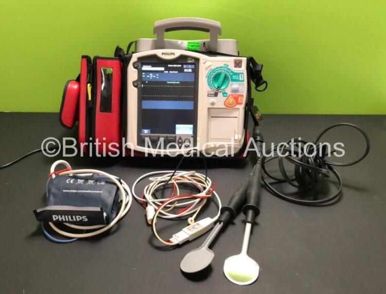 Philips Heartstart MRx Defibrillator Including Pacer, ECG, NIBP, SpO2 and Printer Options with 1 x Philips M3538A Battery, 1 x Philips M3539A Module, 1 x SpO2 Lead, 1 x NIBP Lead, 1 x 3 Lead ECG and 1 x Philips M1742A Internal Paddles In Carry Bag (Powers