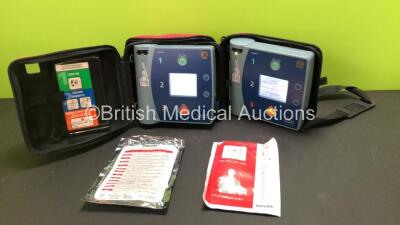 2 x Philips Heartstart FR2+ Defibrillators with 2 x Batteries (Install By - 09/2022 and 10/2023), 1 x Philips HeartStart Adult Training Pads and 1 x Philips Adult Peel and Stick Pads *Expiry - 02/2009* in Cases (Both Power Up and Pass Self Test)