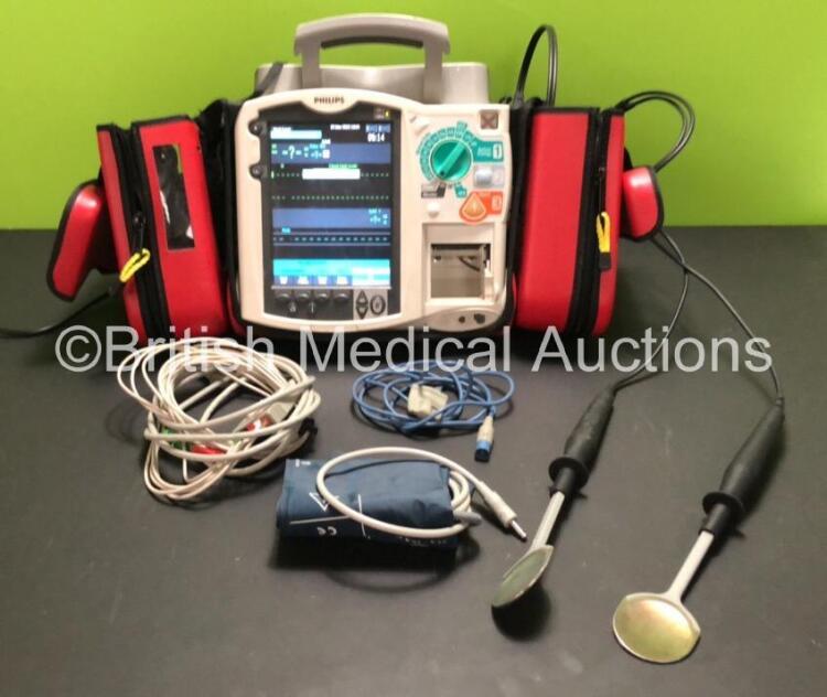 Philips Heartstart MRx Defibrillator Including Pacer, ECG, NIBP, SpO2 and Printer Options with 1 x SpO2 Lead, 1 x NIBP Lead, 1 x 5 Lead ECG and 1 x Philips M1742A Internal Paddles In Carry Bag (Powers Up with Missing Printer Door)