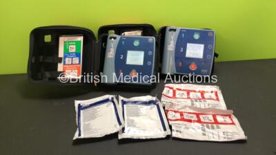 2 x Philips Heartstart FR2+ Defibrillators with 2 x Batteries (Install By - 09/2022 and 09/2026), 2 x Phillips DP Electrode Pads and 2 x Kendall 1710H Multi-Function Defibrillation Electrodes *All Expiry 2021* in Cases (Both Power Up and Pass Self Test)