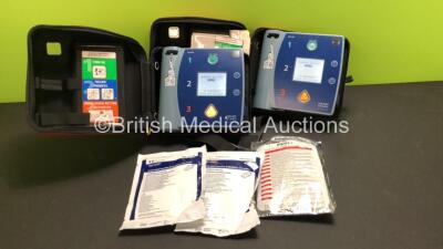 2 x Philips Heartstart FR2+ Defibrillators with 2 x Batteries (Install By - 10/218 and 10/2022), 1 x Philips HeartStart Adult Training Pads and 2 x Covidien Kendall 1710H Multi-Function Defibrillation Electrodes *Both Expiry - 2021* in Cases (Both Power 