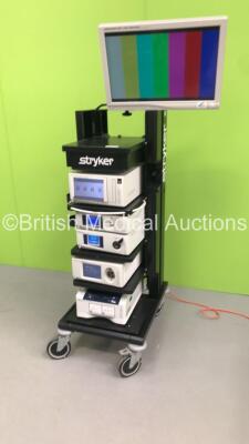 Stryker Stack Trolley with Stryker Vision Elect HDTV Surgical Monitor, Stryker SDC Ultra HD Information Management System, Stryker 1288HD High Definition Camera Control Unit, Stryker L9000 Light Source, Stryker Pneumosure High Flow Insufflator and Stryker - 10