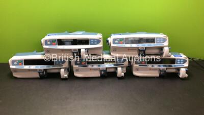5 x CareFusion Alaris CC Syringe Pumps (4 x Power Up with 1 x Service Required, 1 x Alarm and 1 x Blank Screen)
