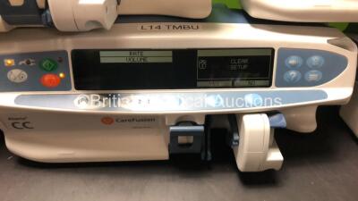 3 x CareFusion and 2 x Cardinal Health Alaris CC Syringe Pumps (All Power Up with 1 x Service Required and 3 x Alarms) - 3