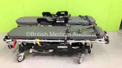 1 x Ferno Pegasus Hydraulic Ambulance Stretcher with Mattresses (Hydraulics Tested Working) and 1 x Ferno Harrier LT Electric Ambulance Stretcher with Battery and Mattress (No Power - Suspect Flat Battery)