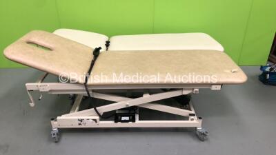 1 x Bristol Maid Electric Patient Examination Couch with Controller (Powers Up - Rips and Marks to Cushions) and 1 x Plinth 2000 Hydraulic Patient Examination Couch (Hydraulics Tested Working) *S/N 53701*