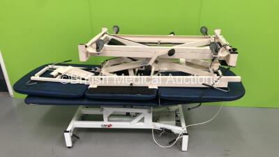 1 x Medi Plinth Electric Patient Examination Couch with Controller (Powers Up - Rips to Cushions) and 1 x Hoskins Hydraulic Patient Examination Couch with Controller (Powers Up - Cuts to Cushions) *S/N 1817776* - 3