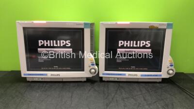 2 x Philips IntelliVue MP70 Touch Screen Patient Monitors Software Revision K.21.42, K.21.42* (Both Power Up) *Mfd 2009, 2009*