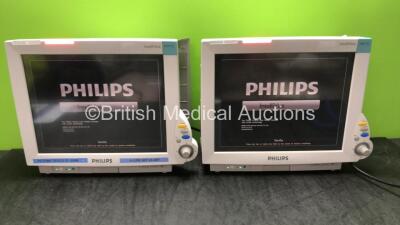 2 x Philips IntelliVue MP70 Touch Screen Patient Monitors Software Revision K.21.42, K.21.42* (Both Power Up) *Mfd 2009, 2009 *