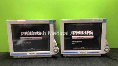 2 x Philips IntelliVue MP70 Touch Screen Patient Monitors Software Revision K.21.42, K.21.42* (Both Power Up) *Mfd 2009, 2009*