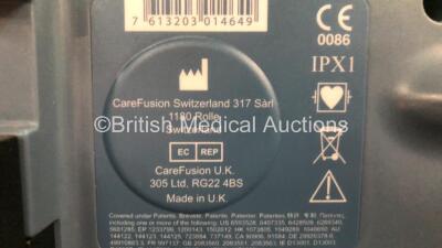 Mixed Lot Including 1 x Carefusion Alaris GH Guardrails Plus Syringe Pump (Powers Up) 6 x Carefusion Baby CO Monitors, 1 x Arjohuntleigh Hoist Battery Charger, 1 x Philips Respironics Nebuliser and 1 x Accoson BP Meter *800214357* - 5